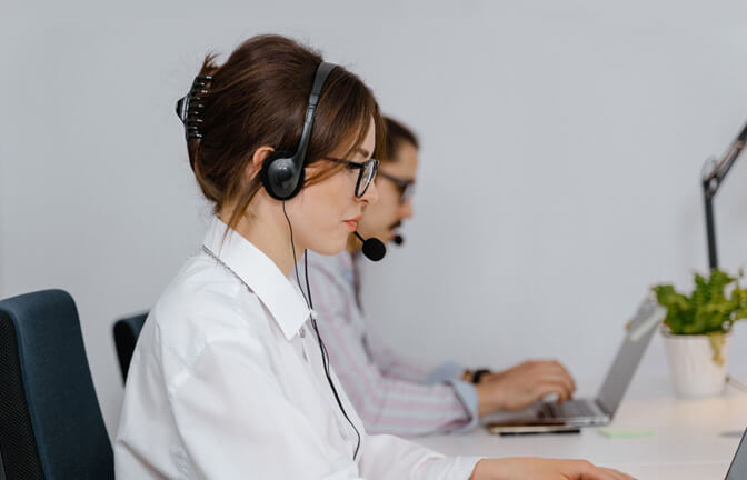 Financial services contact center agents handling customer calls