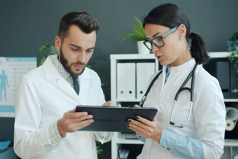Healthcare professionals reviewing patient information
